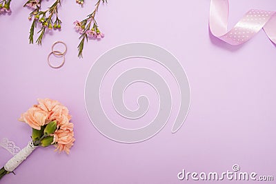 Cute minimalistic flat lay on the wedding theme in delicate lavender colors. Stock Photo
