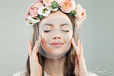 Cute Model Woman Face. Natural Makeup and Flowers, Skincare and Facial Treatment Concept Stock Photo