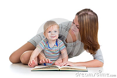Cute mother reading a book to her baby boy Stock Photo
