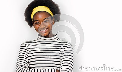 Cute multiracial african girl with an afro hairstyle wearing casual clothes smiling - Isolated on a white nackground, Positive Stock Photo