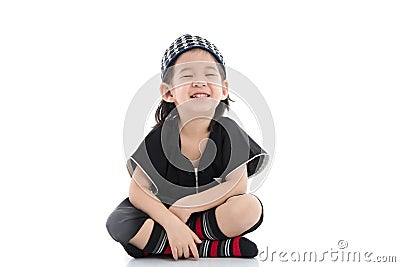 Cute muslim chlid sitting Stock Photo