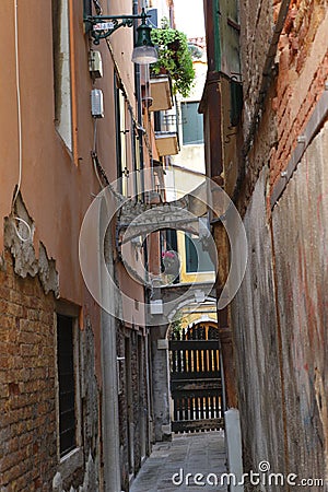 cute narrow street in Venice, Italy during the quarantine Stock Photo