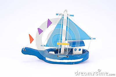 cute old wooden blue fishing boat isolated Stock Photo