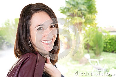 Cute outdoor woman portrait outdoor with cheerful smile Stock Photo