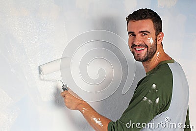 Cute painter enjoying his work Stock Photo