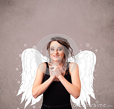 Cute person with angel illustrated wings Stock Photo