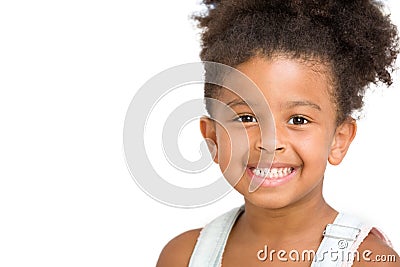 Cute preschool girl smiling in front of white background, copy Stock Photo