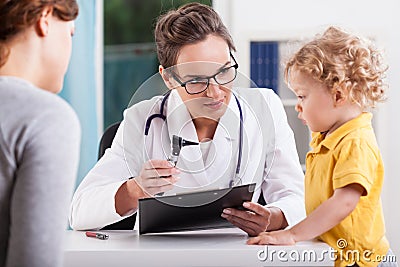 Cute preschooler visiting otolaryngologist Stock Photo