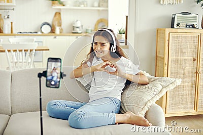 Cute preteen 12s girl blogger record video for vlog Stock Photo