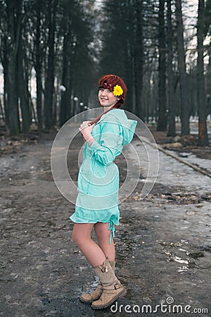 Cute red-haired girl in park Stock Photo