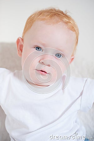 Cute redheaded blue-eyed boy Stock Photo