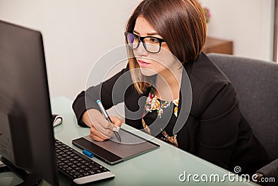 Cute retoucher at work Stock Photo