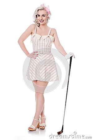 Cute retro girl in mini dress carrying red golf bag over her shoulder, isolated on white with space for text Stock Photo