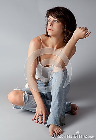 Cute in Ripped Jeans Stock Photo