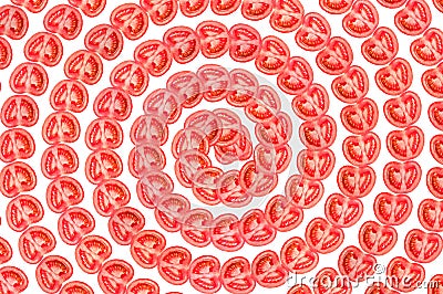 Cute round slices of tomatoes in the form of a spiral or helix isolated on a white background pattern. Top view cut in Stock Photo