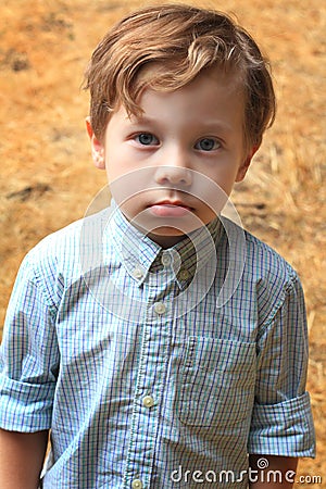 Cute Serious Kid Stock Photo