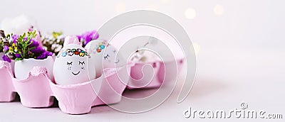 Cute sleeping Easteregg in sweet pink paper egg box Stock Photo