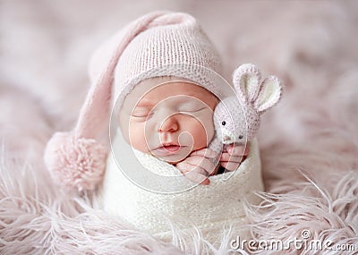 Cute sleepy newborn baby Stock Photo