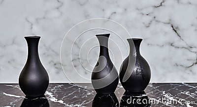 cute slim black ceramic vases in high resolution and sharpness Stock Photo