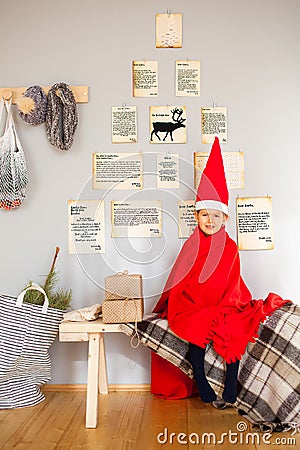 Cute smiling girl in gnome hat Stock Photo