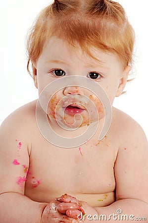 Cute smiling messy baby Stock Photo