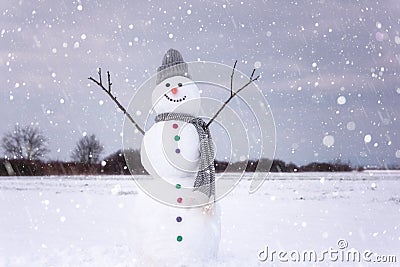 Cute smiling snowman in winter day, happy holidays concept Stock Photo