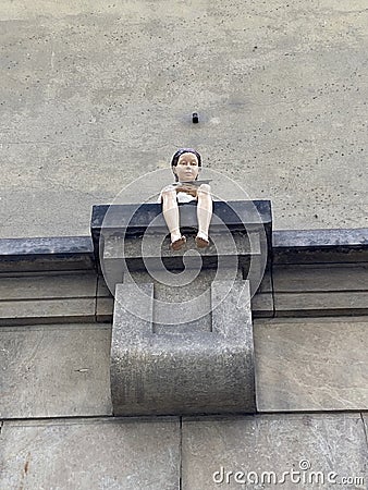 Cute statue in Prague, small Girl with swallow, Czech Republic Editorial Stock Photo