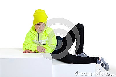 Cute stylish boy posing on staircase Stock Photo