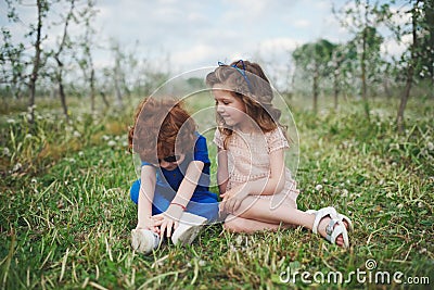 Cute stylish children in summer park Stock Photo