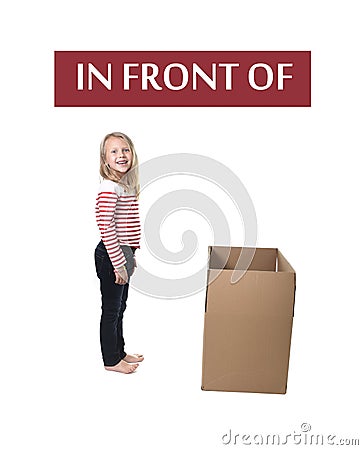 Cute and sweet blond hair child standing in front of cardboard box learning English card set Stock Photo