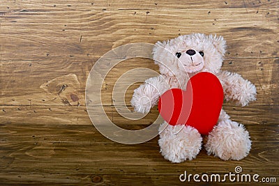Cute teddy bear with red heart Stock Photo