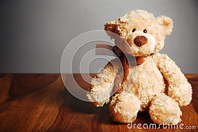 Cute teddy bear on a table Stock Photo