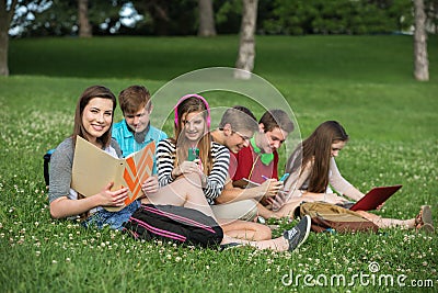 Cute Teens Studying Stock Photo