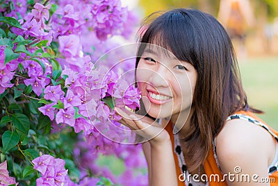 Cute Thai girl is very happy with purple Kertas Stock Photo