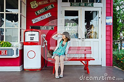 Cute Thai girl is watching toward sunlight Stock Photo