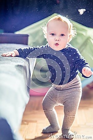 Cute toddler boy in a room posing Stock Photo