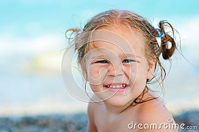 Cute toddler girl on sea background Stock Photo