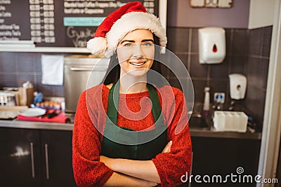 Cute waitress standing behind the counter Stock Photo