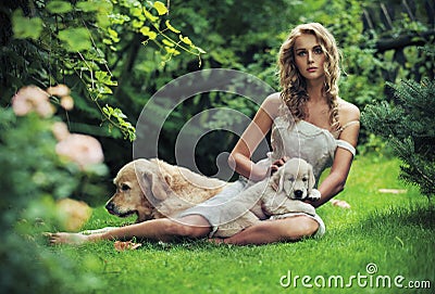 Cute woman with dogs Stock Photo