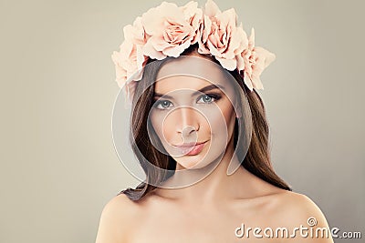 Cute Woman with Perfect Makeup and Summer Roses Stock Photo