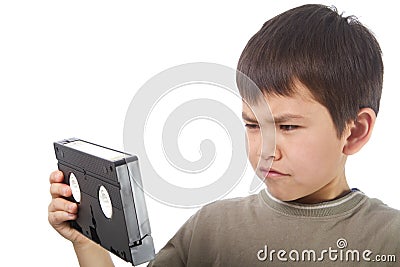 Cute young asian boy seems confused by a video Stock Photo