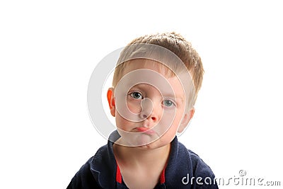 Cute young boy pouting Stock Photo