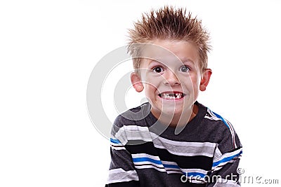 Cute young boy smiling and missing teeth Stock Photo