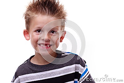 Cute young boy smiling and missing teeth Stock Photo