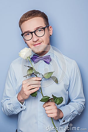Cute young men with flower. Date, birthday, Valentine Stock Photo