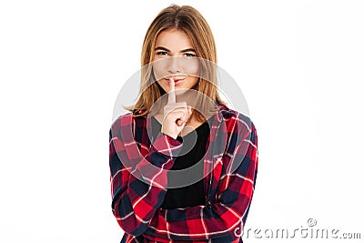 Cute young woman make silence gesture. Stock Photo