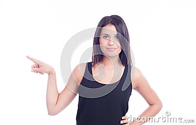 Cute young woman pointing to the side Stock Photo