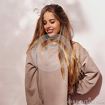 Cute young woman in sweatshirt Stock Photo