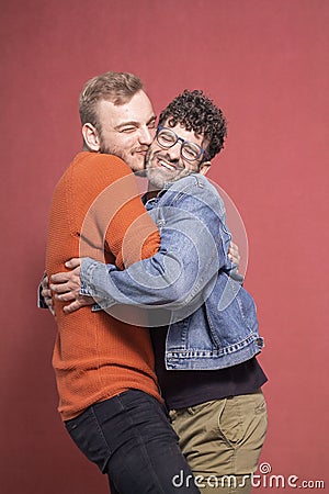 Cutest cuddling gay couple ever Stock Photo