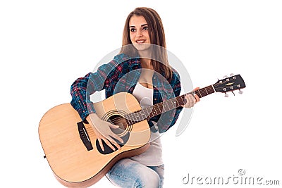 Cutie brunette woman with guitar Stock Photo